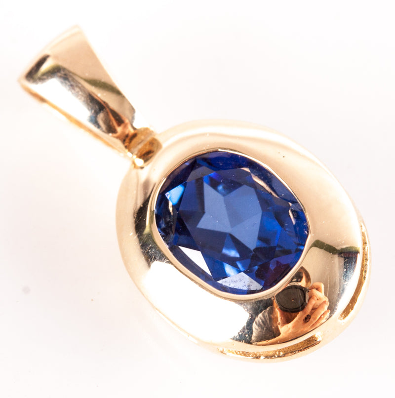 14k Yellow Gold Lab-Created Oval Tanzanite Solitaire Pendant 1.35ctw 2.13g