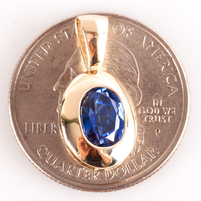 14k Yellow Gold Lab-Created Oval Tanzanite Solitaire Pendant 1.35ctw 2.13g